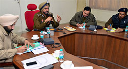 IGP (Bathinda range), Nirmal Singh Dhillon presiding over a meeting of SSPs and other police officials of the Malwa region at Faridkot on Saturday regarding security arrangements for the assembly elections
