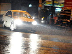 After a cloudy day, the city witnessed light showers on Sunday evening