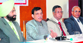 Dr Avinash Chander, chief controller, Missiles and Strategic System, DRDO (second from left), along with Dr Manjit Singh, director, Terminal Ballistics Research Laboratory (left) and other DRDO scientists during the celebrations of TRBL in Chandigarh on Sunday.