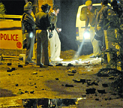 Delhi police inspects Dargah Shah-e-Mardan at Jor Gagh near Karbala Maidan in New Delhi on Sunday.