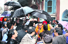 A candidate and his supporters campaign door to door in one of the constituencies in Jalandhar on Sunday.