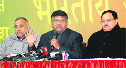 (Left) BJP general secretary Ravi Shankar Prasad along with JP Nadda addresses a press conference in Chandigarh on Sunday. 