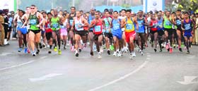 Athletes participate in the Mumbai Marathon on Sunday