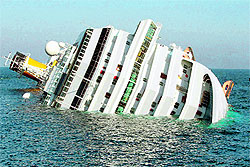 Coast guard divers while searching the submerged part of the Costa Concordia on Sunday found the bodies of two elderly people, raising the death toll to five after the luxury cruise liner ran aground