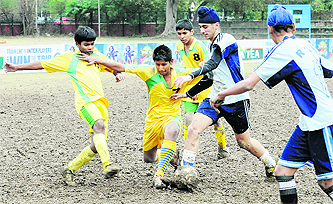 A match in progress during a soccer meet in Chandigarh on Monday.