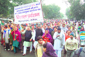 BPL protesters take out a protest march at Sonepat on Monday. 