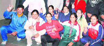 The champions flash the victory sign at DAV College for Girls, Yamunanagar, on Monday
