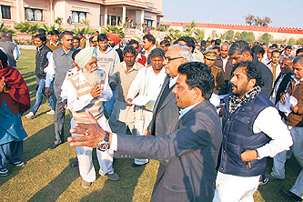 Chief Minister Bhupinder Singh Hooda listens to public grievances in Sirsa.
