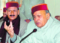 Chief Minister PK Dhumal addresses a press conference in Dharamsala 
