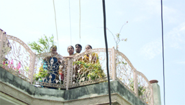11-kv wires passing over the rooftops in Sunder Nagar pose a continuous threat for residents.