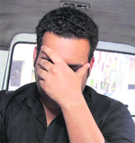 Alistair Pereira being taken to a police station in Mumbai on Monday. 