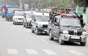 Cops and paramilitary forces stage a flag march in Bathinda on Tuesday. 