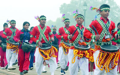 Schoolchildren perform at Rajpath during the rehearsal for the Republic Day parade in New Delhi on Tuesday. 