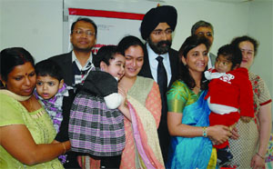 Three children (from left) Ansa, Anees and Tejasree at Medanta Hospital after liver transplantation, with their mothers and doctors A.S. Soin and Neelam Mohan in New Delhi on Monday. A team of doctors created history by performing swap and domino liver transplant operations simultaneously.