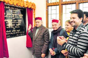 Chief Minister PK Dhumal inaugurates a science laboratory in Government Senior Secondary School at Nalti in Hamirpur on Tuesday