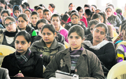 Students of the Khalsa College for Women attend a lecture on The Important of Voting Rights in Ludhiana on Tuesday.