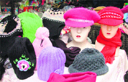 Woollen caps displayed at a market in Ludhiana.