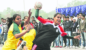 Players in action during a handball match in Chandigarh on Wednesday.