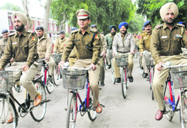 Sector-17 police station SHO Ranjodh Singh, ASP (Central) Desraj Singh and Sector-11 police station SHO Gurmukh Singh take part in a bicycle rally to strengthen beat patrolling in Chandigarh on Wednesday. 