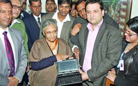 Delhi Chief Minister Sheila Dikshit launches the socio-economic caste census at her residence in New Delhi on Wednesday