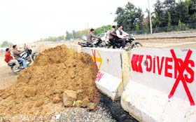 Bikers chart their own route to cross NH-1 in Karnal on Wednesday