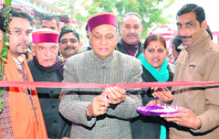 Chief Minister PK Dhumal inaugurates the science block at a government school at Didwin Tikkar in Hamirpur