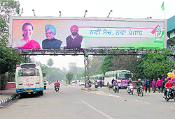 A large hoarding of the Congress party installed outside Guru Nanak Stadium in Ludhiana