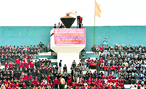 Athletes light torch during the opening day of the 57th Nationa School Games at Guru Nanak Stadium in Ludhiana