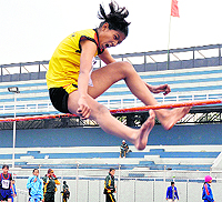 An athlete takes part in the high jump event at Guru Nanak Stadium in Ludhiana