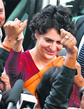 Priyanka Gandhi with Congress supporters during a stopover in Rae Bareli. 