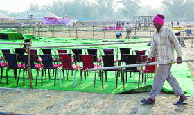 Workers deck up the venue for the Prime Minister's rally at Ranjit Avenue in Amritsar on Thursday.