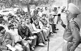 A policeman apprises auto drivers of traffic rules at Sector 12 in Chandigarh on Thursday