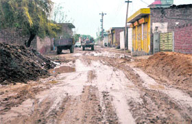 A view of a road after rain in Jagraon. Most of the roads in the constituency are in poor shape.
