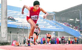Athletes participate in 400m race during the 2nd day of the 57th National School Games at Guru Nanak Stadium in Ludhiana on Thursday. 