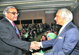 Pakistan High Commissioner Shahid Malik (R) meets the Press Council of India Chairman Markandey Katju.