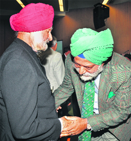 Nehchal Sandhu, Director, Intelligence Bureau greets RS Talwar, President of the Tribune Trust.