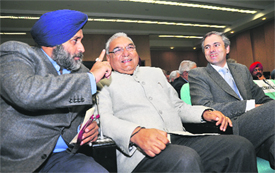 (L-R) Punjab Deputy Chief Minister Sukhbir Badal makes a point with Haryana Chief Minister Bhupinder Singh Hooda and his J&K counterpart Omar Abdullah.