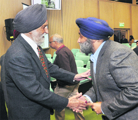 Marshal of the Indian Air Force Arjan Singh (L) with Punjab Deputy Chief Minister Sukhbir Badal. 