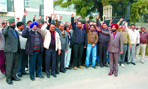 Employees of the BSNL stage a protest outside the office of GM, Telecom, in Bathinda on Friday . Photo: Bhupinder Dhillon