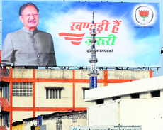 A billboard of the BJP with slogan Khanduri hai zaroori in Dehradun. 