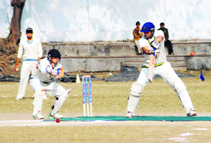A match in the 4th Uttarakhand Shaheed Girish Bhadri Cricket Tournament in progress in Dehradun on Friday.