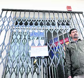 A notice pasted outside the SBI branch at Sarabha Nagar announcing that the bank will remain closed on January 20 as the entire staff is on election duty.