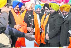 Simarjit Singh Bains (third from left), along with DS Chawla (in dark blue turban) at an election meeting in Ludhiana on Friday.