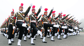 Soldiers of the paramilitary forces rehearse for the Republic Day parade in New Delhi on Friday.