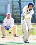 A player plays a shot during a cricket match at Vivek High School, Sector 38, Chandigarh, on Saturday. 