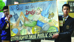 School students, along with representatives of NGOs, take out a rally against drugs in Jalandhar on Saturday. 