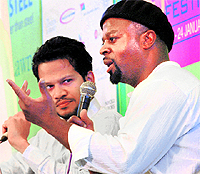 Booker Prize winning Nigerian author Ben Okri (R) and Chandrahas Chaudhury