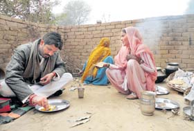 'Raja' eats in shanties, listens to grievances of the poor