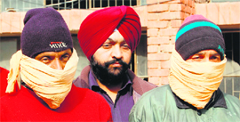 The accused in police custody.