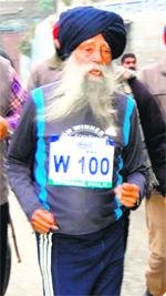 Centurian Fauja Singh takes part in 'Run for the City' campaign in Amritsar on Sunday.